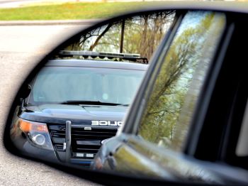 Police in the rearview mirror.
